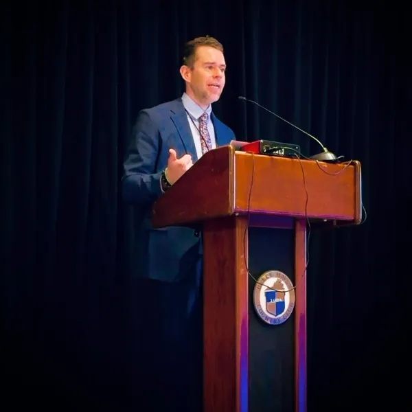 Photograph of Dr. Jonny Norris presenting at 2024 MSDA symposium